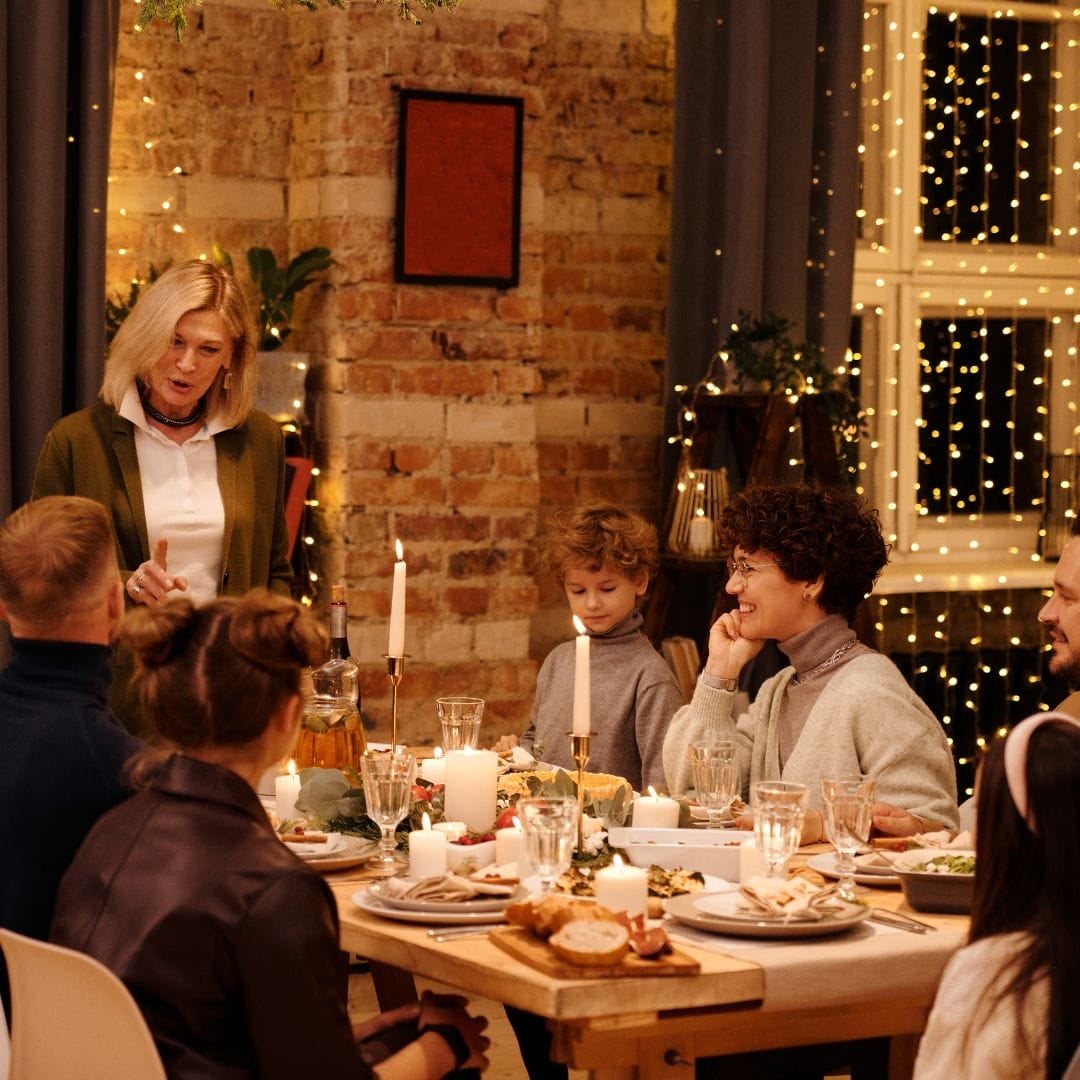 Family gathered at decorated dinner table